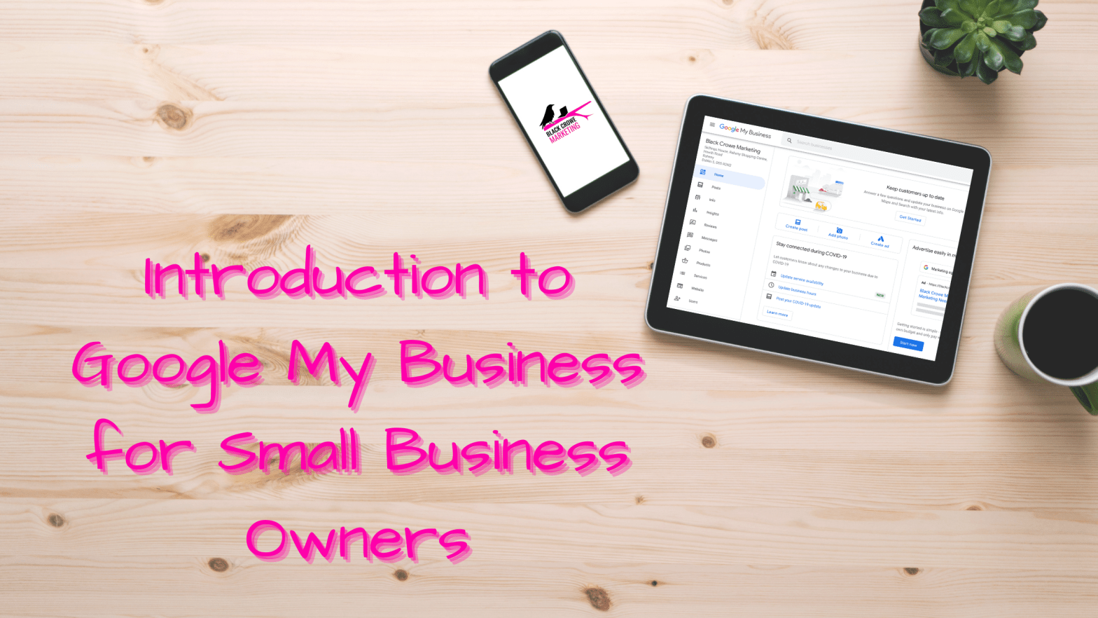 Intro to Google My Business for small business owners in pink on wooden background with GMB dashboard open on tablet